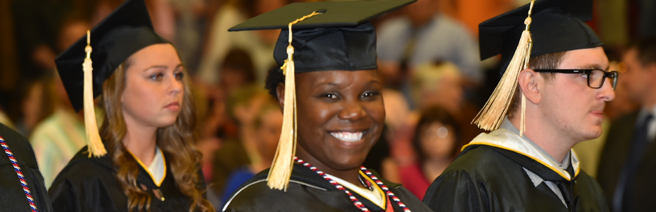 Spring commencement photo in the gym with students