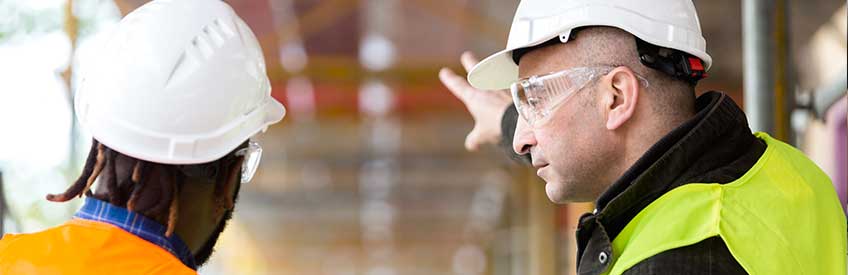 Construction foreman training apprentice