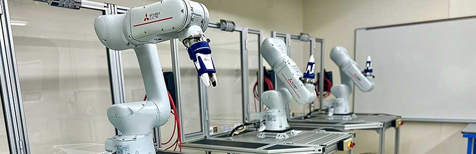 3 robotic arms, part of JCC's mechatronics lab