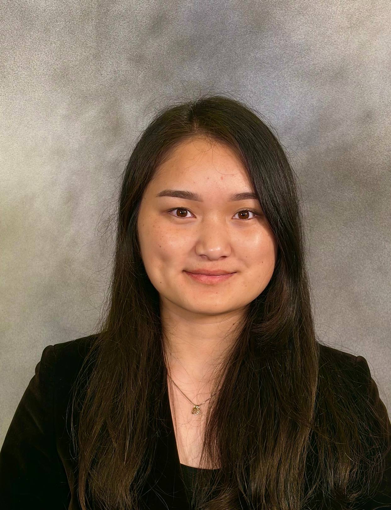Baian Abdyrasulova, the Honors program featured student posing for a photo
