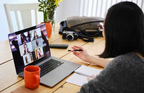 Student on laptop with Online Class